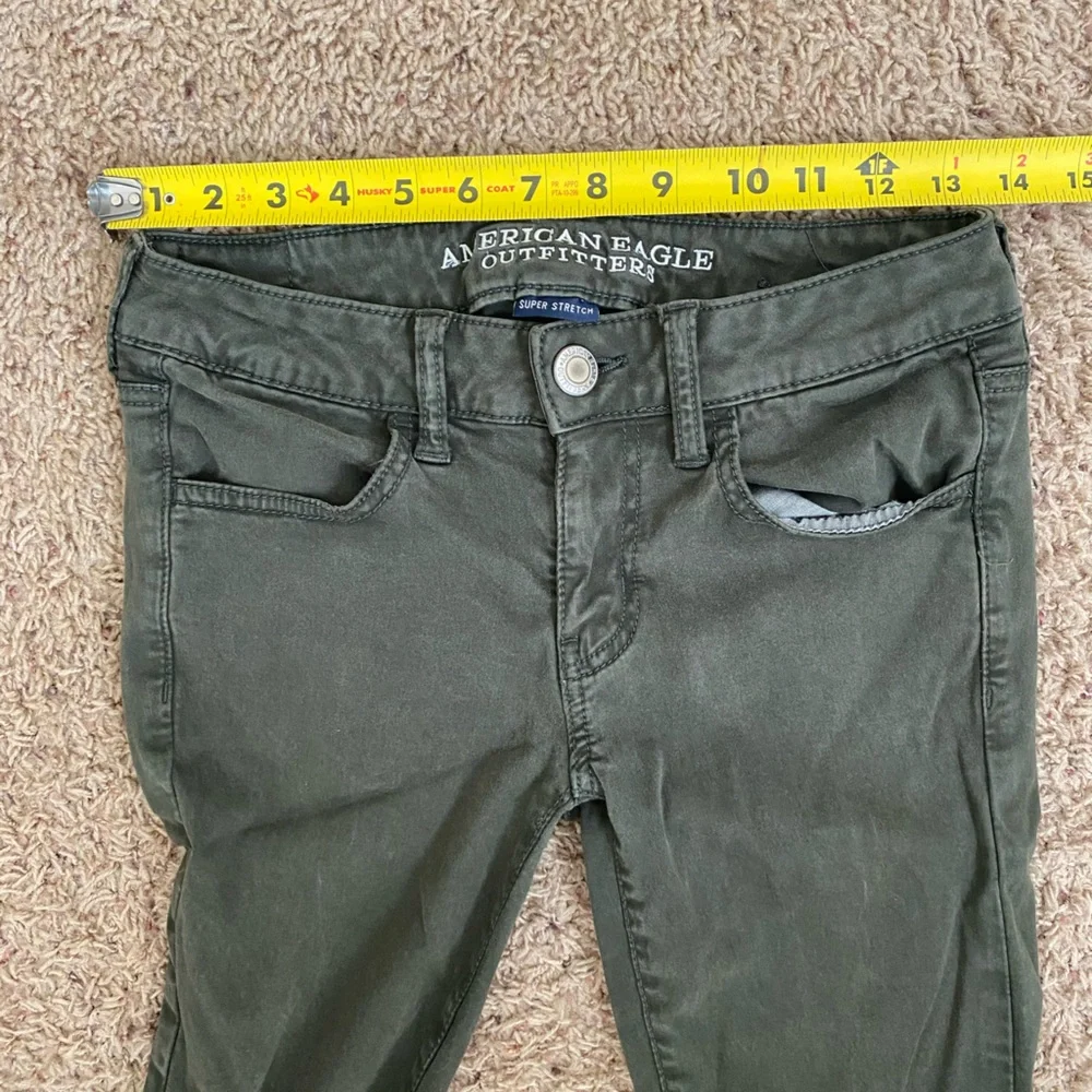 American Eagle Distressed Green Jeggings size 2